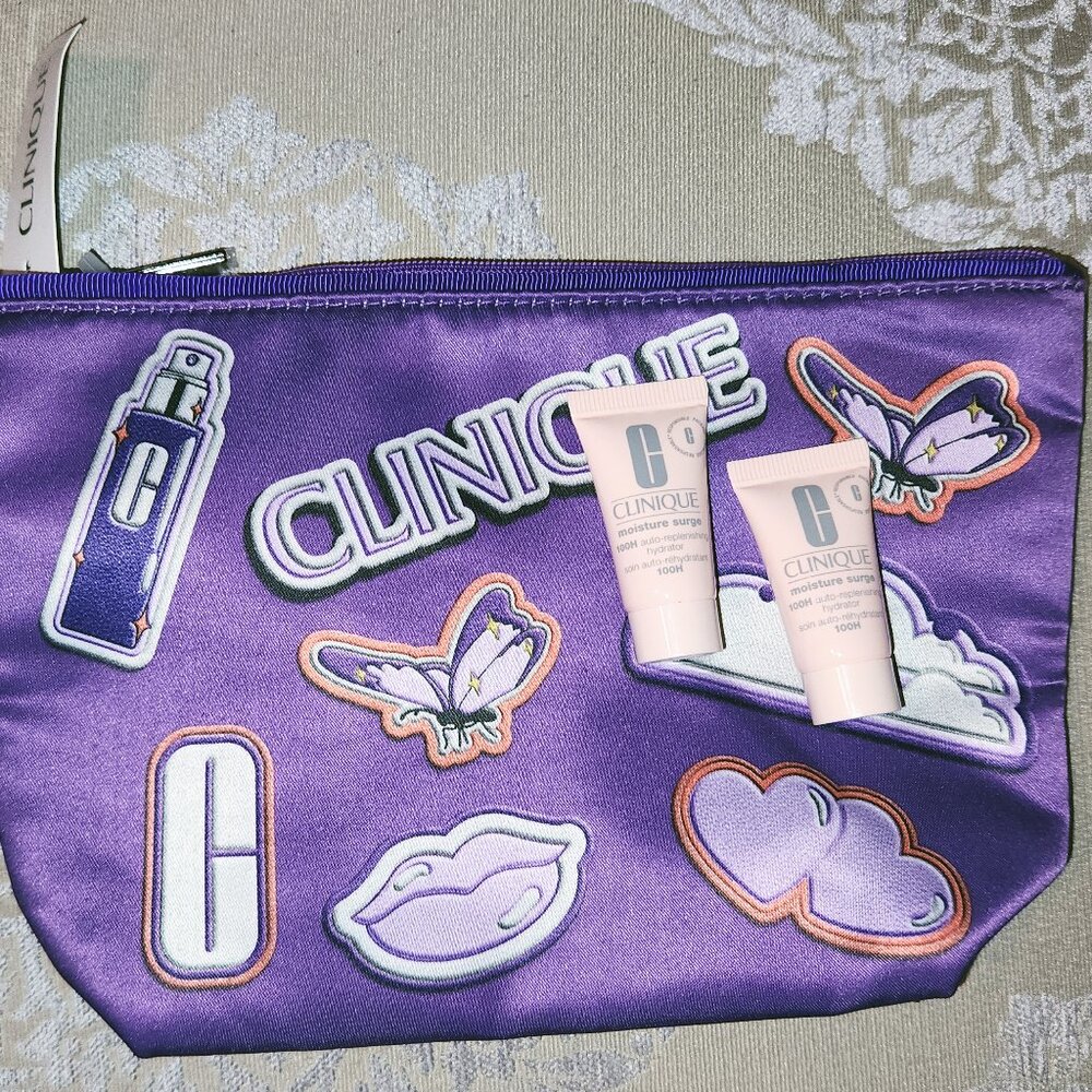 Clinique Purple Satin Cosmetic Bag w/ 2 travel size Moisture Surge - NWT